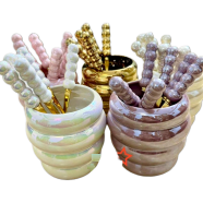 Metallic Teaspoons and Forks image