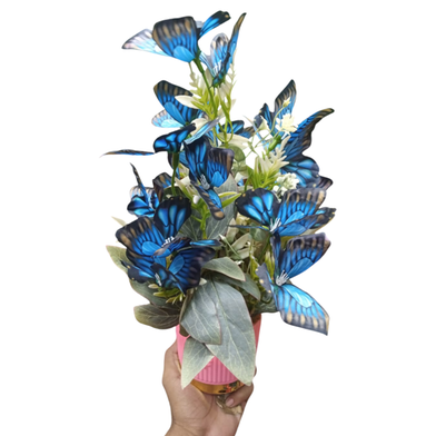 Artificial Butterflies Potentially Part of an Artificial Plant Arrangement. image