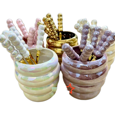 Metallic Teaspoons and Forks image