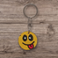 Face Savoring Food Hand-Painted Wooden Keyring image