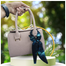 Girls Fashionable Handbag With a Scarf Tied To The Handle image