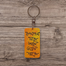 Lekhapora Change Ami Vashi Gange Hand-Painted Wooden Keyring image